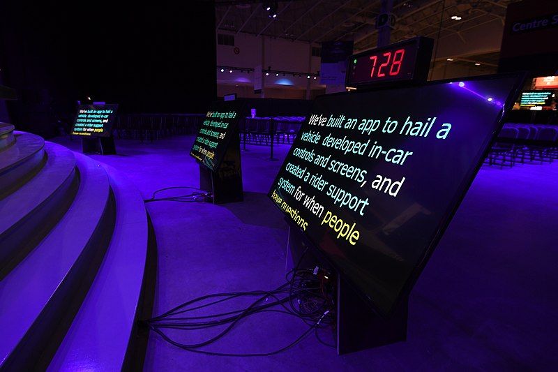 Stage teleprompter at a conference