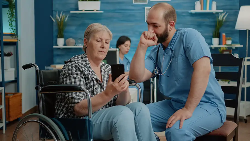 woman showing a video to her doctor